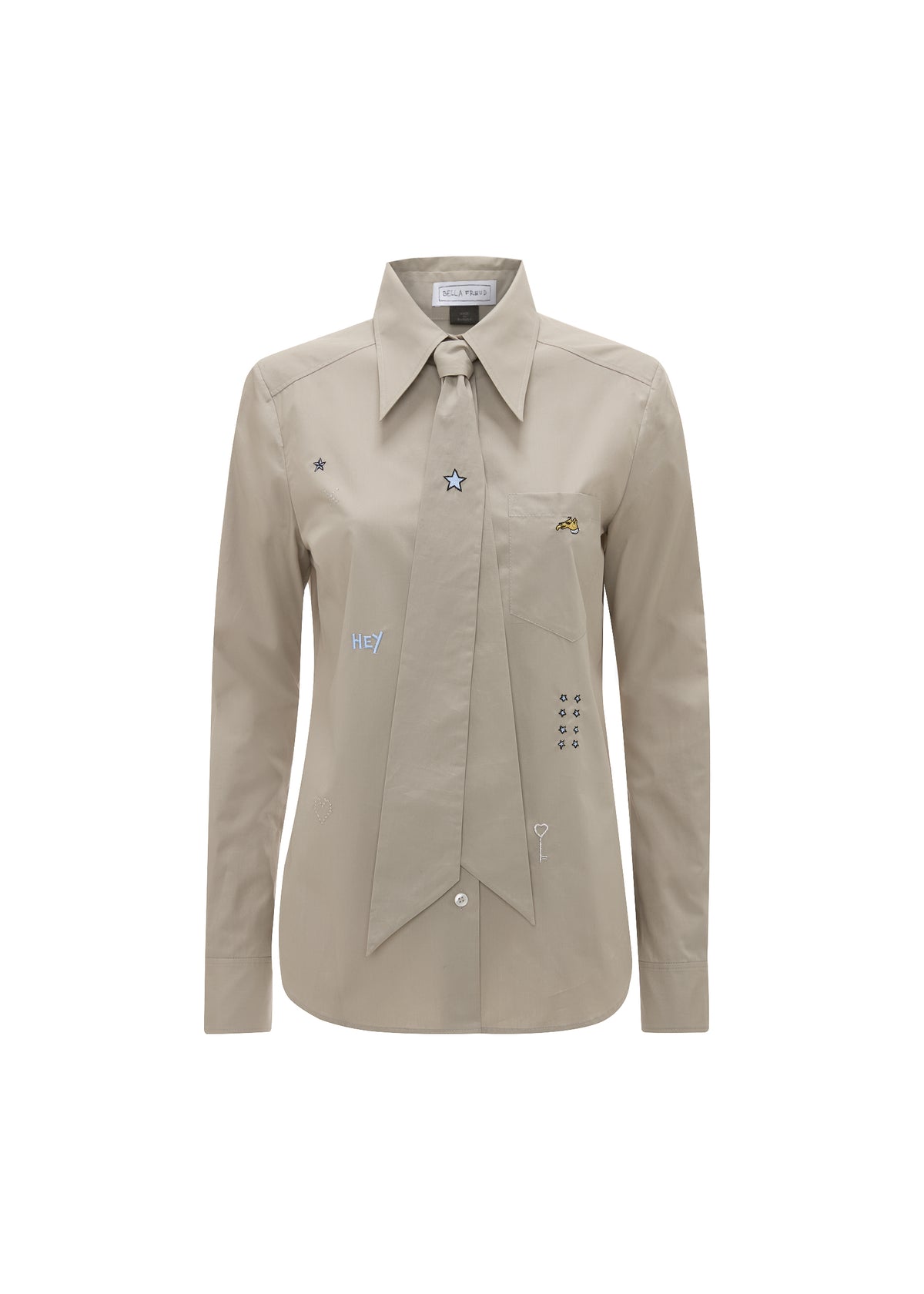 Beige shirt with embroidered details on a white background